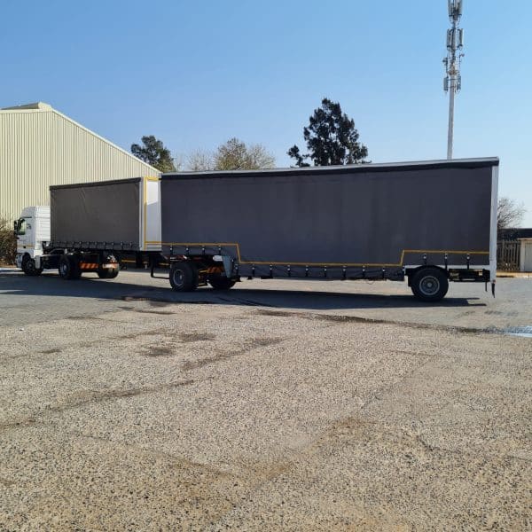 75cb581d-c358-46b0-9cc2-8120e2bd22be 1995 BARKIT & 1983 CTS COMBINATION FURNITURE LINK TRAILER